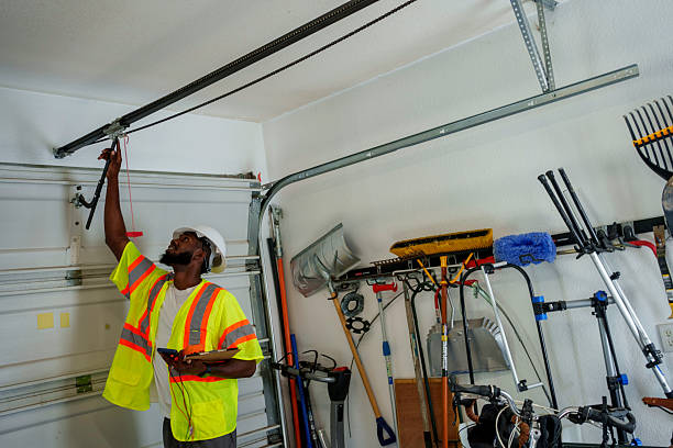 Professional Garage Door Panel Replacement technician working in McDonough, GA